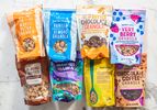 Various Trader Joes granola packages arranged on a marble surface